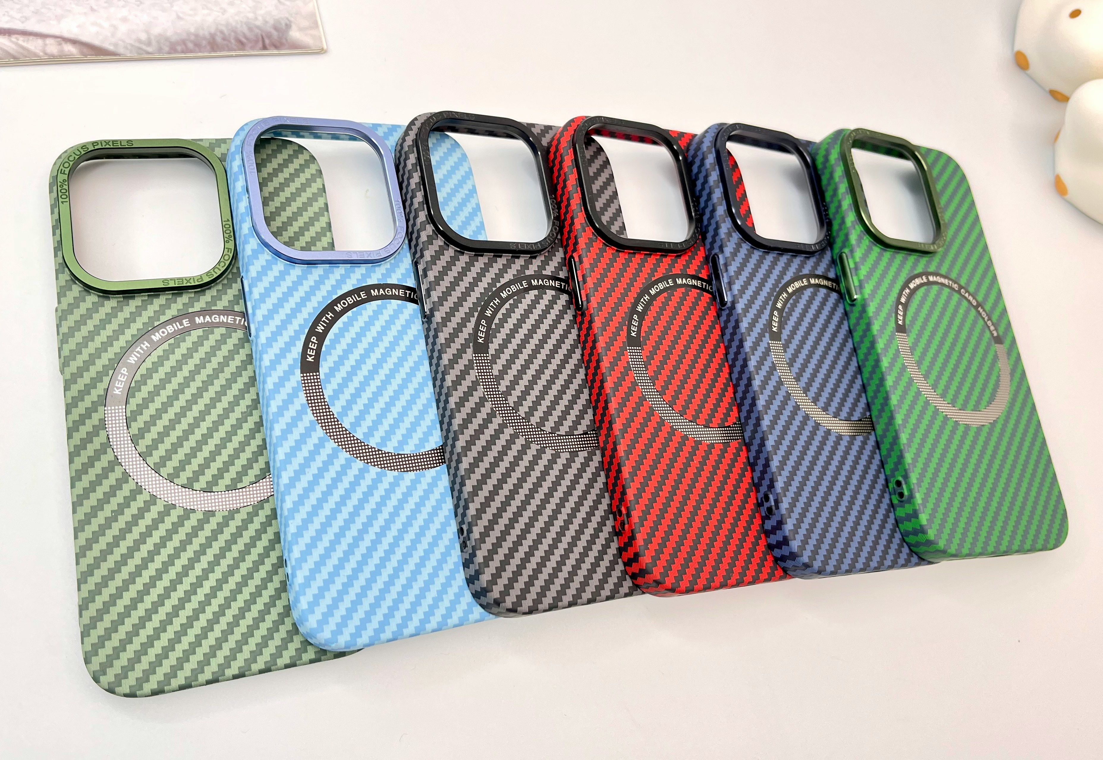 A row of patterned phone cases in multiple colors